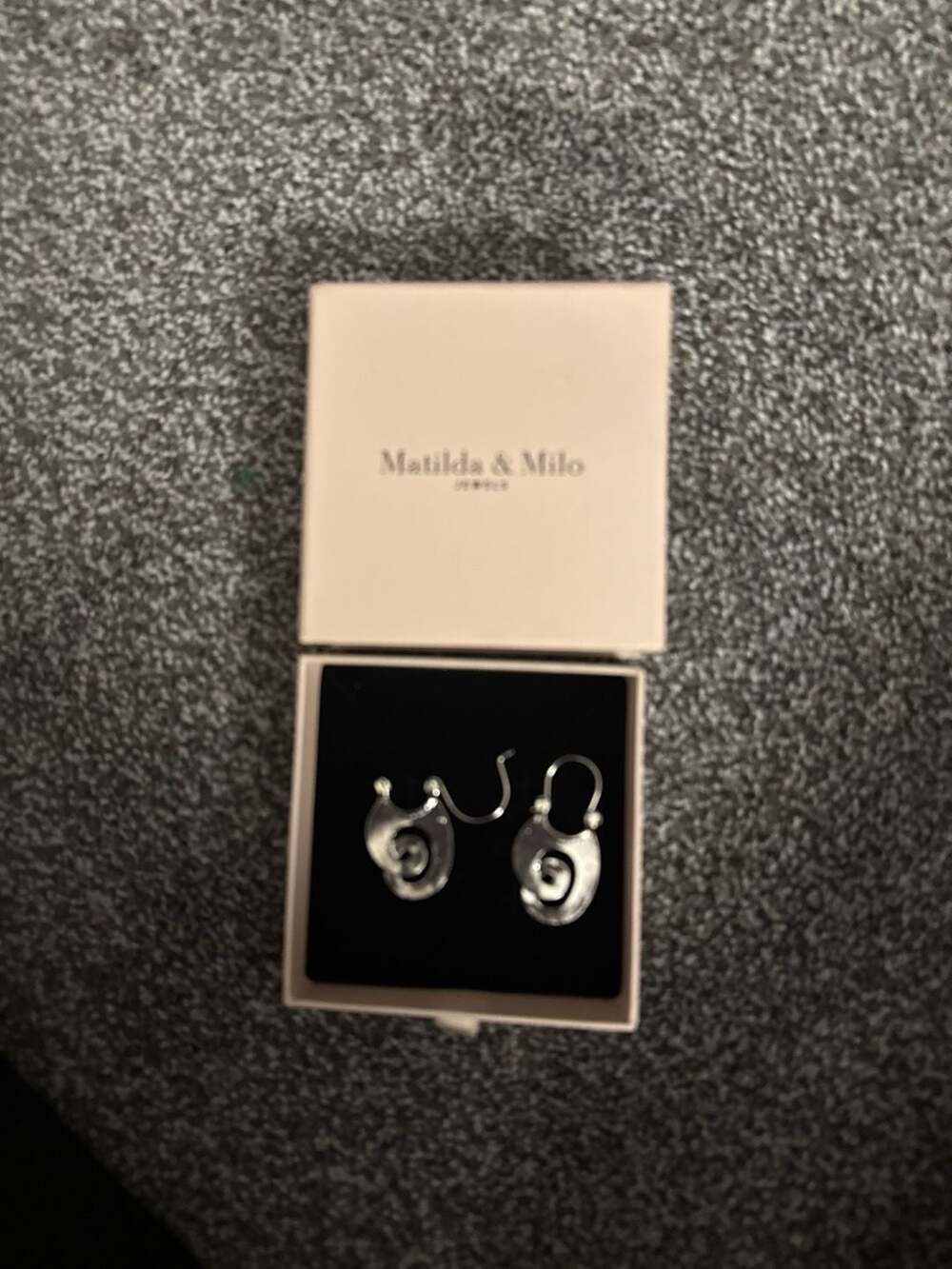 Matilda and Milo Silver Spiral Theader Earrings With a Tribal Pattern